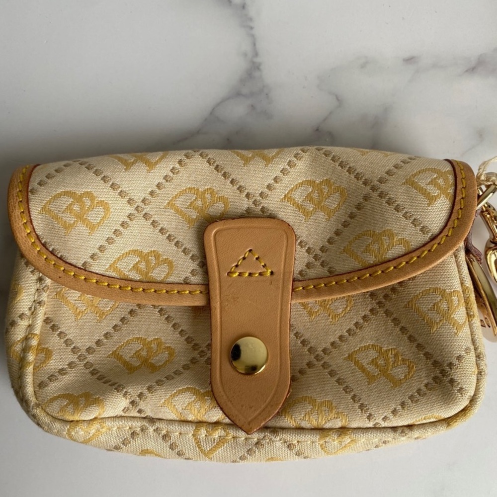 Dooney and Bourke wristlet, cream and beige